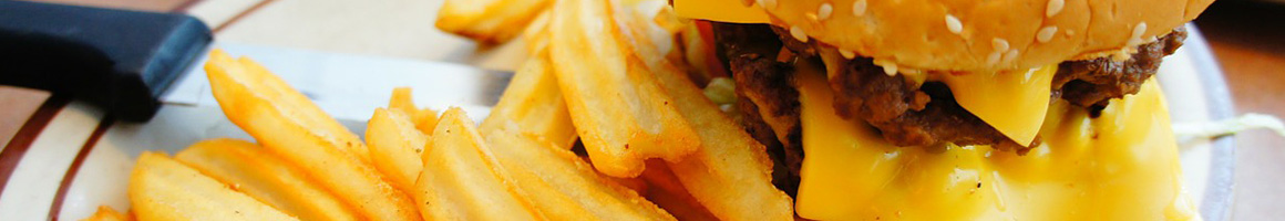 Eating Burger Hot Dog Cheesesteak at Steaks Unlimited restaurant in Seaside Heights, NJ.
